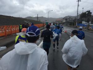 雨の中のランナー